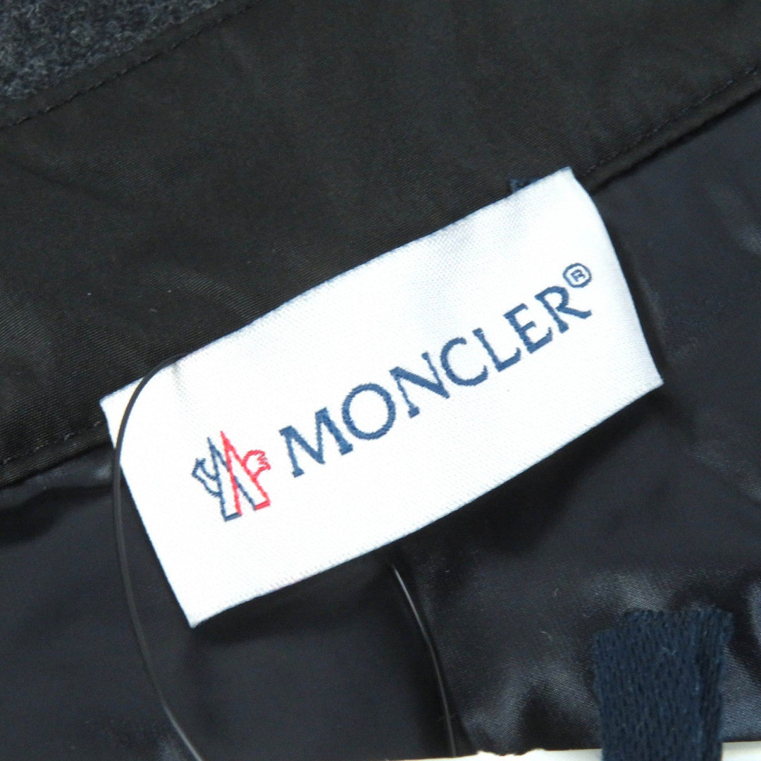 MONCLER Down jacket Outer: 100% polyester, Lining: 100% nylon, Part: 70% wool, Part: 25% nylon, Part: 5% cashmere Black dark gray CAMICIA Women 44 Used Authentic