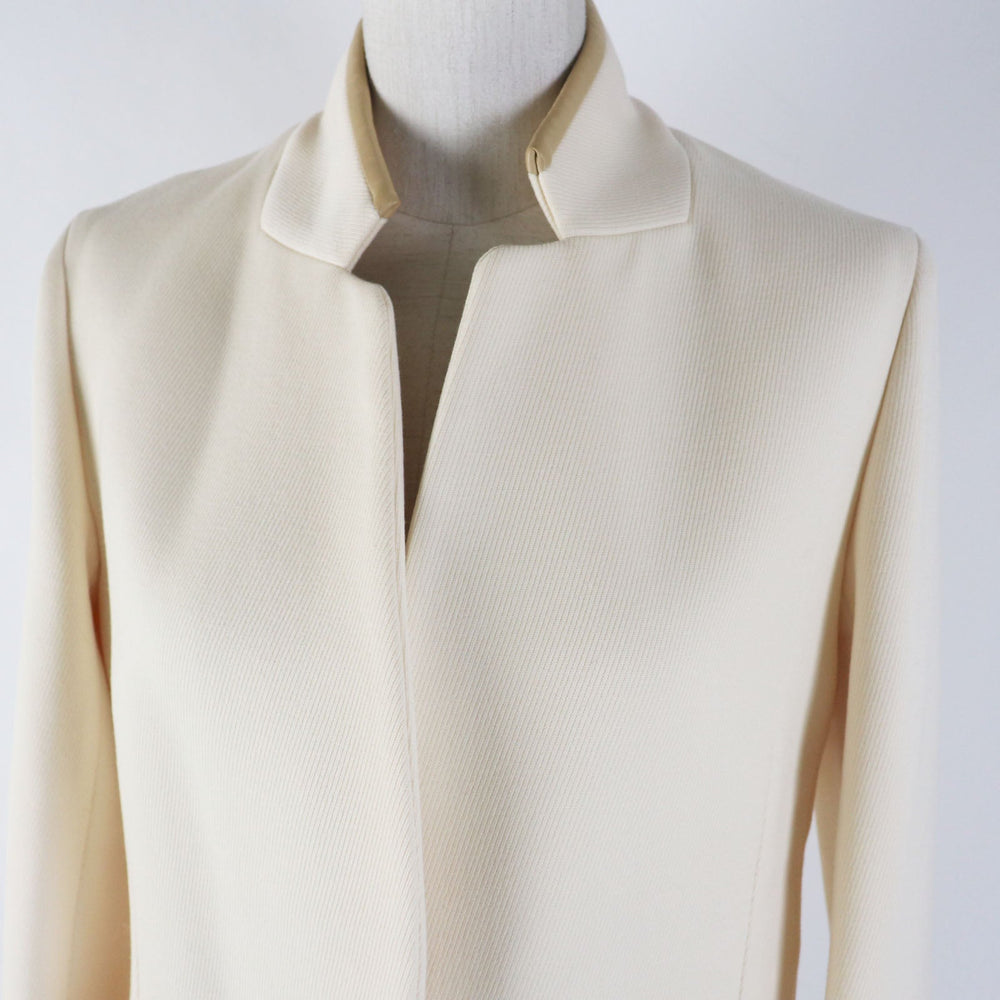 HERMES Other outerwear Outer: 95% wool, Outer: 5% cashmere, Lining: 65% rayon, Lining: 35% silk, Part: sheepskin Ivory beige Prefall collection Women 36 Used Authentic