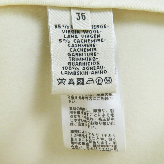 HERMES Other outerwear Outer: 95% wool, Outer: 5% cashmere, Lining: 65% rayon, Lining: 35% silk, Part: sheepskin Ivory beige Prefall collection Women 36 Used Authentic