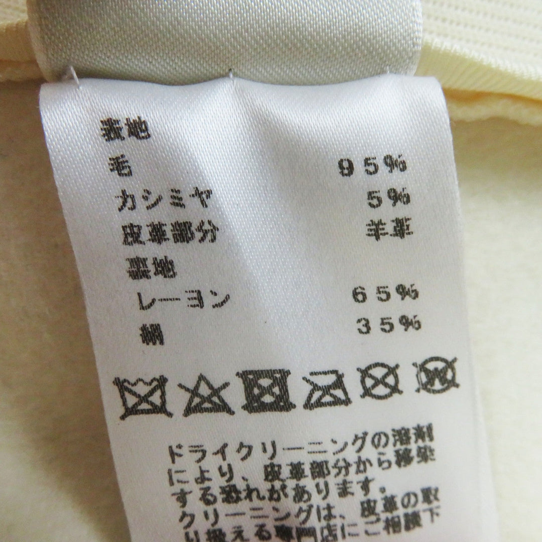 HERMES Other outerwear Outer: 95% wool, Outer: 5% cashmere, Lining: 65% rayon, Lining: 35% silk, Part: sheepskin Ivory beige Prefall collection Women 36 Used Authentic