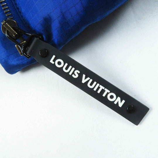 LOUIS VUITTON Down jacket Outer: 71% nylon, Outer: 29% polyester, Lining: 50% polyester, Lining: 50% cotton, Filling: 90% down, Belt: 100% cotton, Sheepskin blue Women 34 Used Authentic