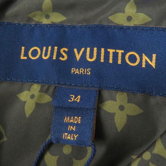LOUIS VUITTON Down jacket Outer: 71% nylon, Outer: 29% polyester, Lining: 50% polyester, Lining: 50% cotton, Filling: 90% down, Belt: 100% cotton, Sheepskin blue Women 34 Used Authentic