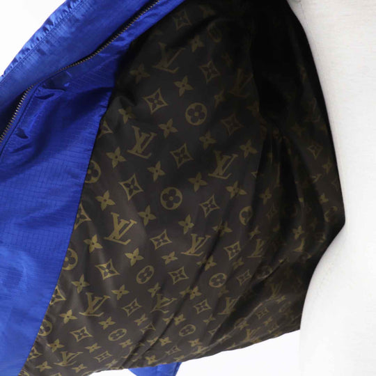 LOUIS VUITTON Down jacket Outer: 71% nylon, Outer: 29% polyester, Lining: 50% polyester, Lining: 50% cotton, Filling: 90% down, Belt: 100% cotton, Sheepskin blue Women 34 Used Authentic