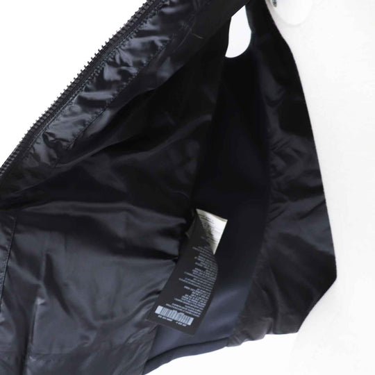 PRADA Down vest 29B984 Outer: 100% polyamide (nylon), Lining: 100% polyamide (nylon), Part: 80% polyamide (nylon), Part: 20% elastane (polyurethane), Filling: 90% down black Women 38 Used Authentic