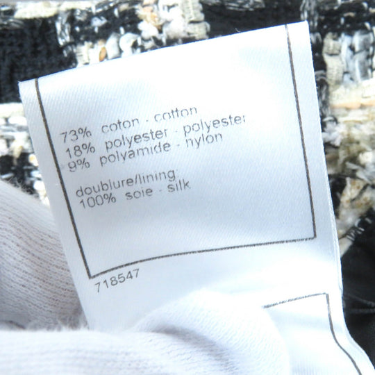 CHANEL Tweed skirt 04A P23948 Outer: 73% cotton, Outer: 18% polyester, Outer: 9% polyamide, Lining: 100% silk Black Beige type Women 38 Used Authentic