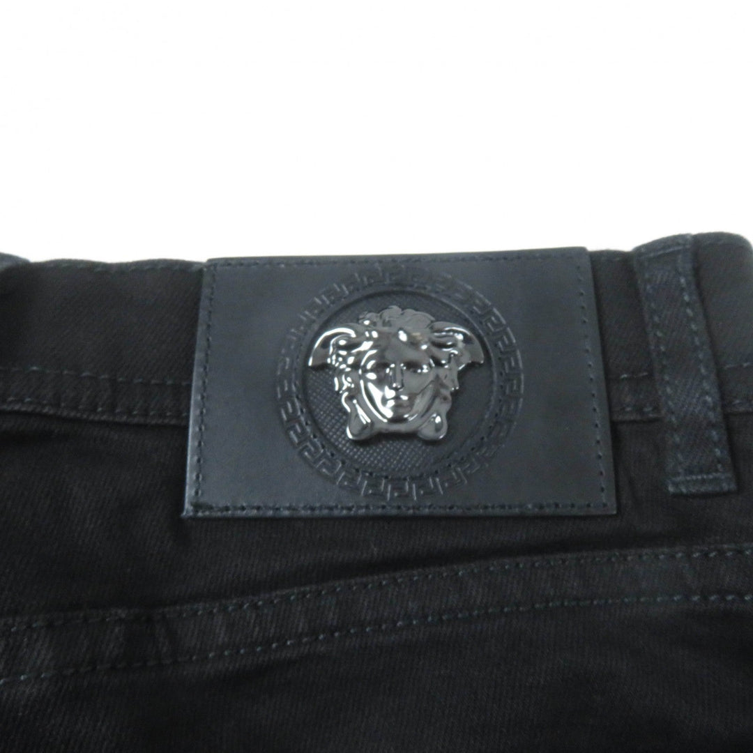 VERSACE Denim pants Main: 96% cotton, Main: 4% polyurethane, Part: 82% nylon, Part: 18% polyurethane, Part: 100% polyester black Women 25 Used Authentic