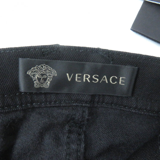VERSACE Denim pants Main: 96% cotton, Main: 4% polyurethane, Part: 82% nylon, Part: 18% polyurethane, Part: 100% polyester black Women 25 Used Authentic