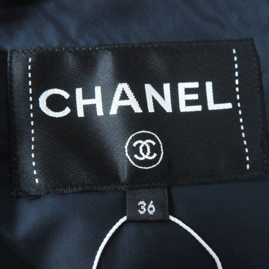 CHANEL Down jacket P59432 Outer: 98% polyamide (nylon), Outer: 2% polyurethane, Filling: 90% down, Filling: 10% feather, Lining: 100% polyamide (nylon), Part: 100% polyester Dark Navy Pink type Coconeige Women 36 Used Authentic