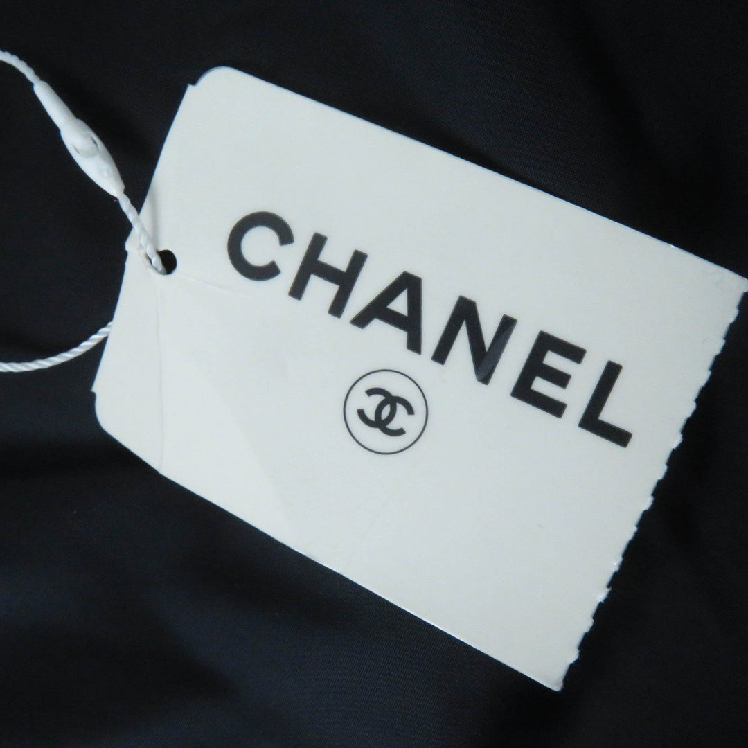 CHANEL Down jacket P59432 Outer: 98% polyamide (nylon), Outer: 2% polyurethane, Filling: 90% down, Filling: 10% feather, Lining: 100% polyamide (nylon), Part: 100% polyester Dark Navy Pink type Coconeige Women 36 Used Authentic