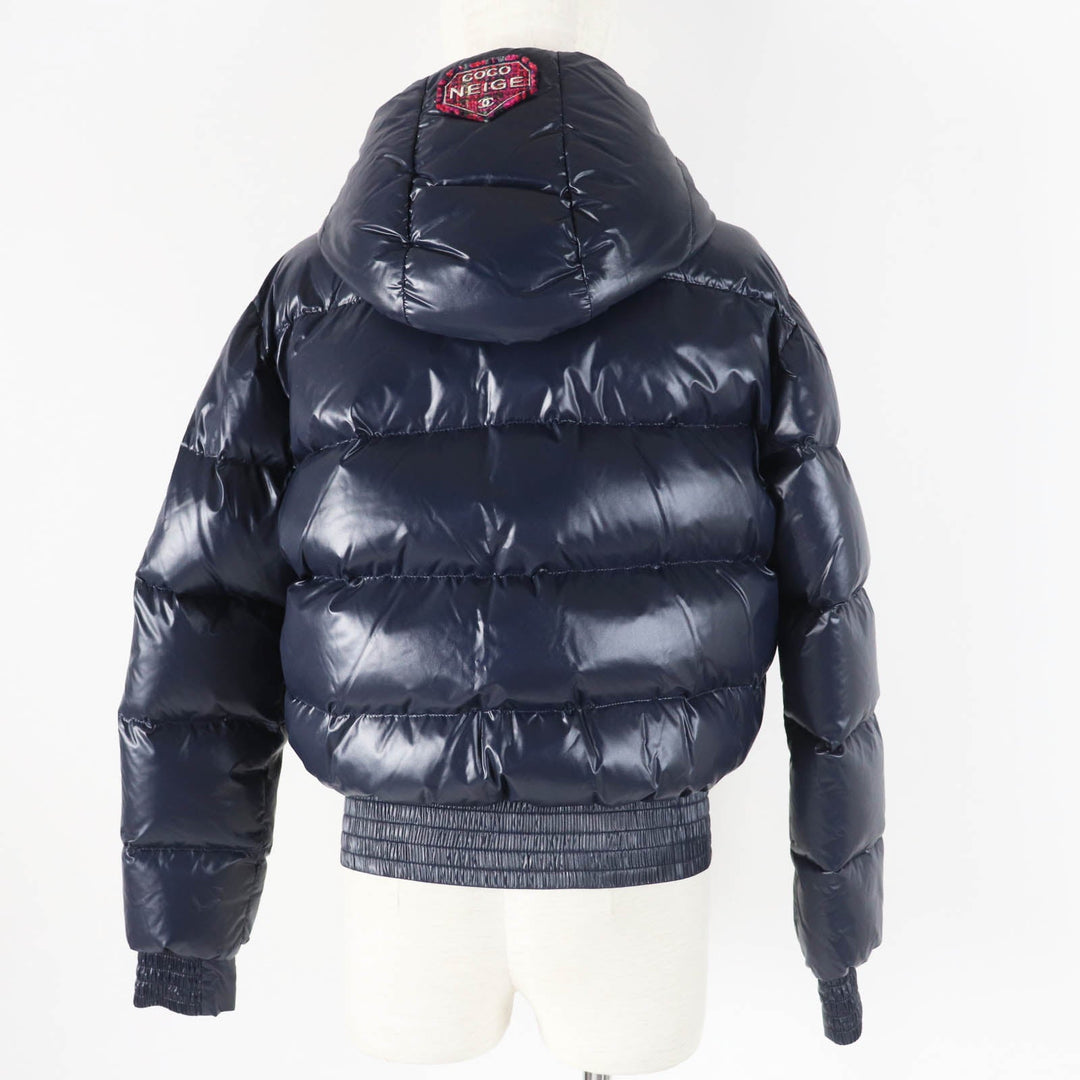 CHANEL Down jacket P59432 Outer: 98% polyamide (nylon), Outer: 2% polyurethane, Filling: 90% down, Filling: 10% feather, Lining: 100% polyamide (nylon), Part: 100% polyester Dark Navy Pink type Coconeige Women 36 Used Authentic