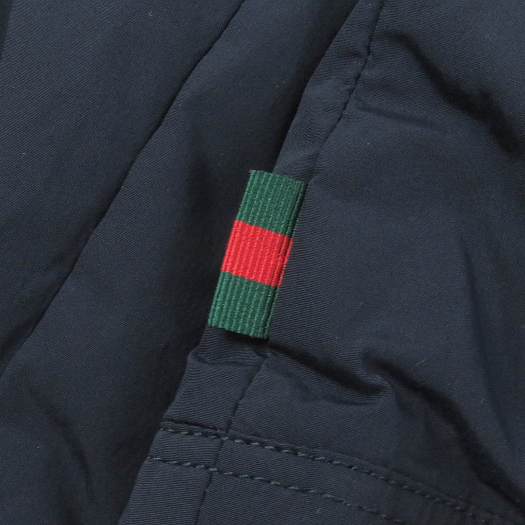 GUCCI Down jacket 322555 Main: 92% nylon, Main: 8% polyurethane, Part: 98% wool, Part: 2% polyurethane, Filling: 100% down Navy mens 44 Used Authentic