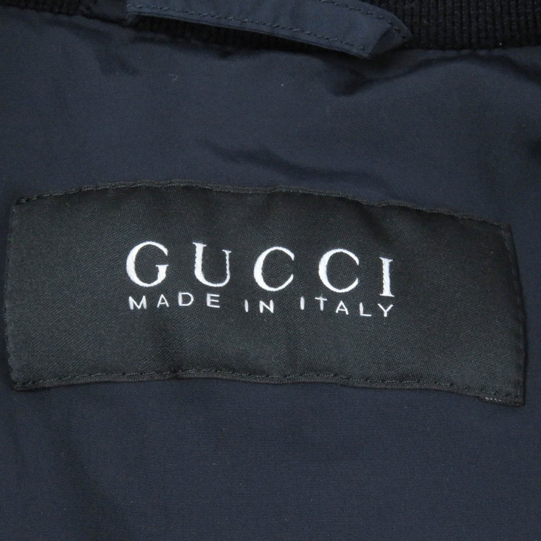 GUCCI Down jacket 322555 Main: 92% nylon, Main: 8% polyurethane, Part: 98% wool, Part: 2% polyurethane, Filling: 100% down Navy mens 44 Used Authentic