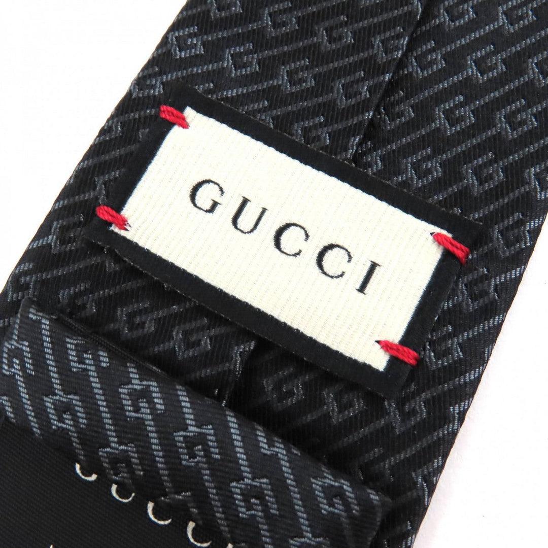 GUCCI tie Main: 100% silk, Lining: 60% cupra, Lining: 40% silk Dark brown gray mens Used Authentic