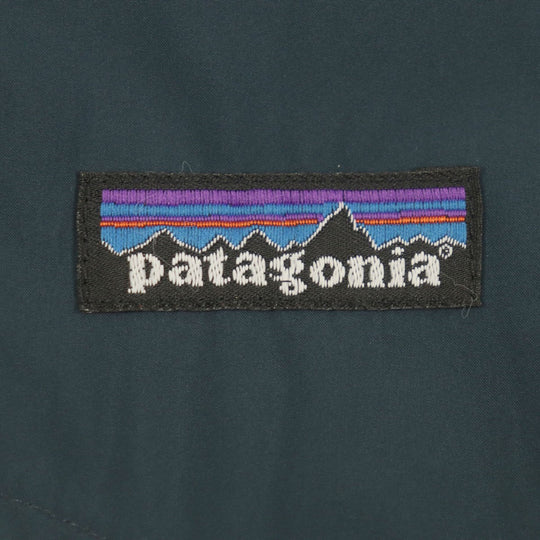 patagonia Down vest 27571 Outer: 100% polyester, Lining: 100% polyester, Filling: 80% down, Filling: 20% other Navy beige mens L Used Authentic