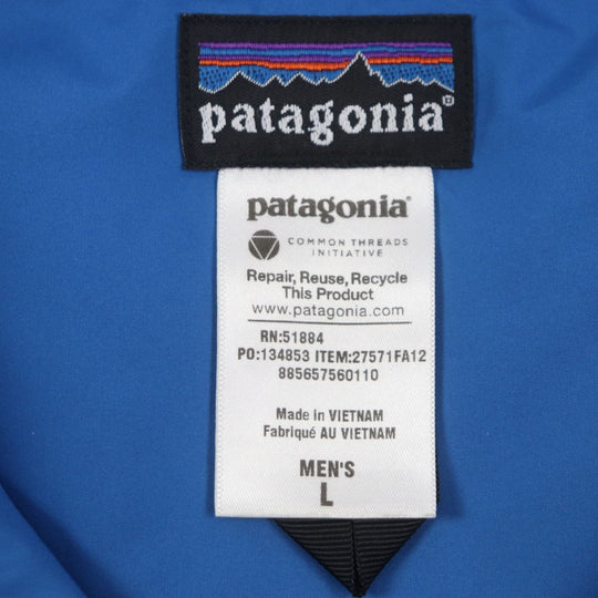 patagonia Down vest 27571 Outer: 100% polyester, Lining: 100% polyester, Filling: 80% down, Filling: 20% other Navy beige mens L Used Authentic