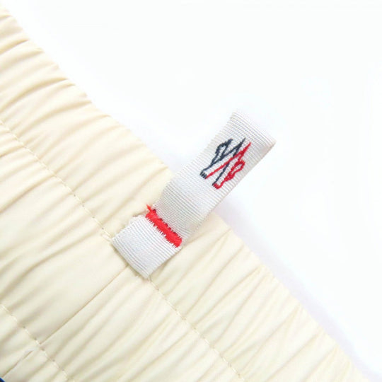 MONCLER GRENOBLE Pants H20988H00008 Main: 85% cotton, Main: 15% rayon, Part: 100% nylon, Part: 100% nylon, Part: 100% nylon Grey Ivory Purple PANTALONE Women M Used Authentic
