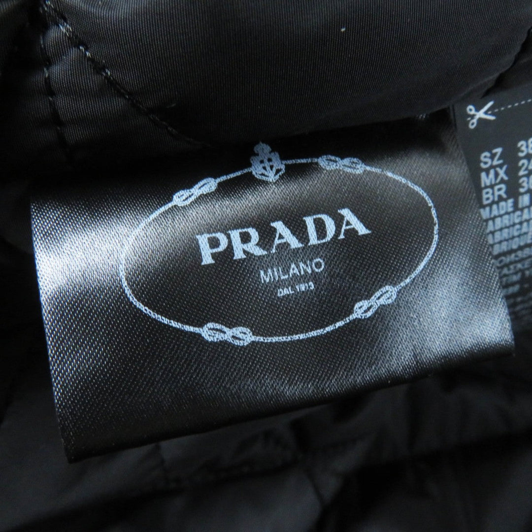 PRADA coat P594L Main: 55% virgin wool, Main: 45% cashmere, Lining: 100% recycled polyamide, Filling: 55% polyester, Filling: 45% recycled polyester black Women 38 Used Authentic