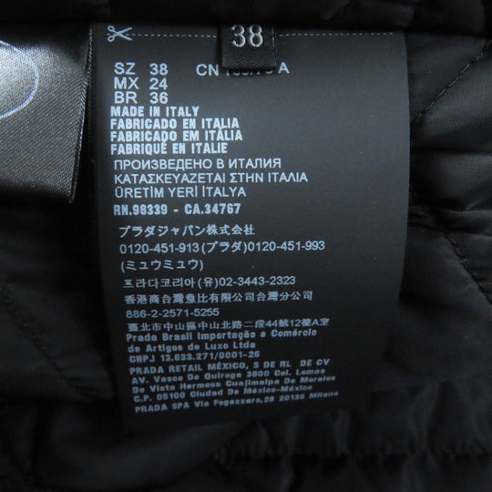 PRADA coat P594L Main: 55% virgin wool, Main: 45% cashmere, Lining: 100% recycled polyamide, Filling: 55% polyester, Filling: 45% recycled polyester black Women 38 Used Authentic
