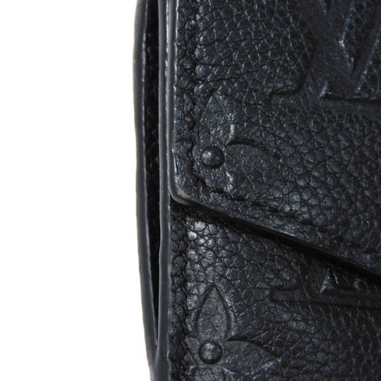LOUIS VUITTON Coin case M60633 Implant leather (monogram embossed) black Monogram Unplant Pochette cree