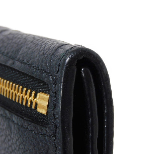 LOUIS VUITTON Coin case M60633 Implant leather (monogram embossed) black Monogram Unplant Pochette cree