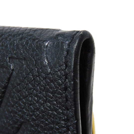 LOUIS VUITTON Coin case M60633 Implant leather (monogram embossed) black Monogram Unplant Pochette cree