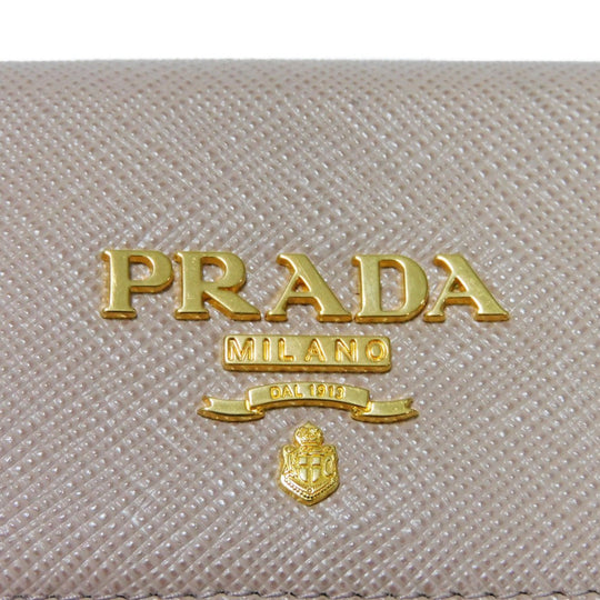 PRADA Key case Key holder  1PG004 ZLP F0KNX Safiano leather (stamped) Cipria x Fuoco logo metal Saffiano 4-ring keychain