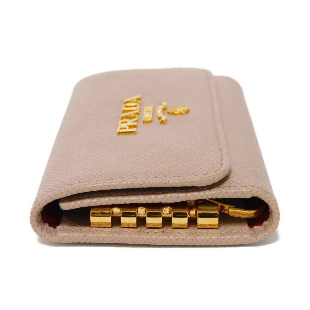 PRADA Key case Key holder  1PG004 ZLP F0KNX Safiano leather (stamped) Cipria x Fuoco logo metal Saffiano 4-ring keychain