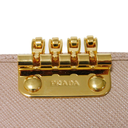 PRADA Key case Key holder  1PG004 ZLP F0KNX Safiano leather (stamped) Cipria x Fuoco logo metal Saffiano 4-ring keychain