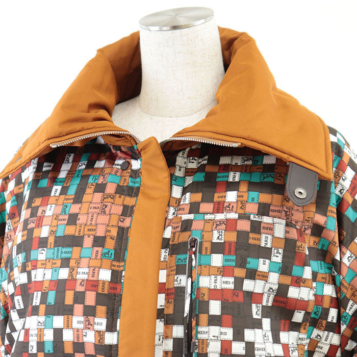 HERMES Down jacket [Outer material] 100% polyester; [Lining] 98% polyester, 2% polyurethane; [Filling] 90% down, 10% feather; [Knitted part] 80% virgin wool Orange Women 36 Used Authentic
