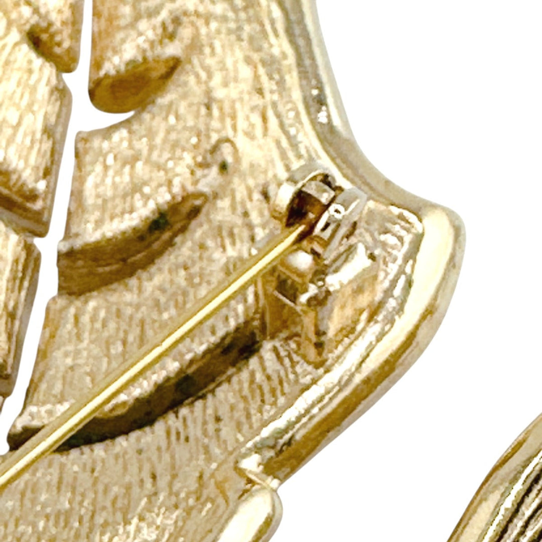 Christian Dior Brooch metal gold rotating pin type Leaf motif Light stone unisex(Unisex) Used Authentic