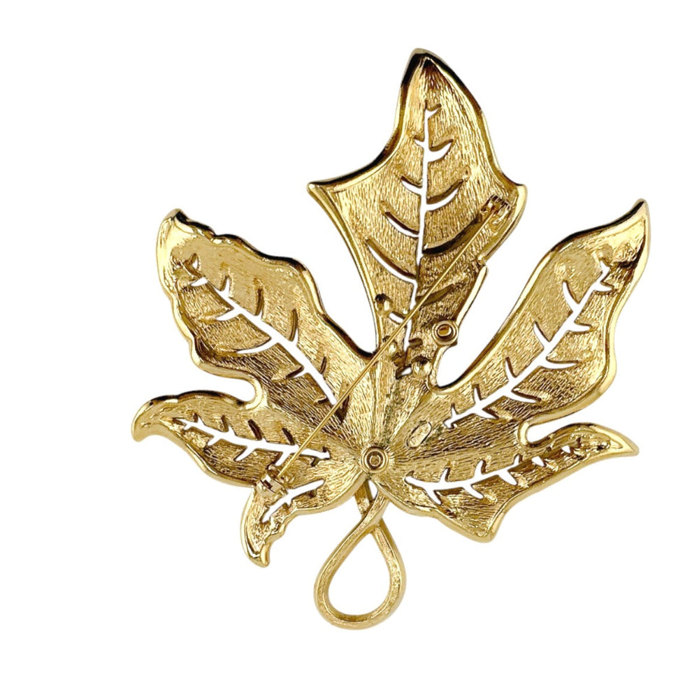 Christian Dior Brooch metal gold rotating pin type Leaf motif Light stone unisex(Unisex) Used Authentic