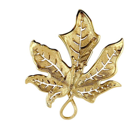 Christian Dior Brooch metal gold rotating pin type Leaf motif Light stone unisex(Unisex) Used Authentic