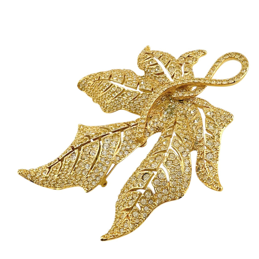 Christian Dior Brooch metal gold rotating pin type Leaf motif Light stone unisex(Unisex) Used Authentic