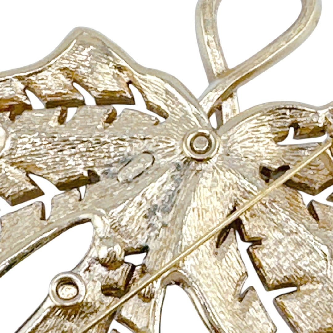 Christian Dior Brooch metal gold rotating pin type Leaf motif Light stone unisex(Unisex) Used Authentic