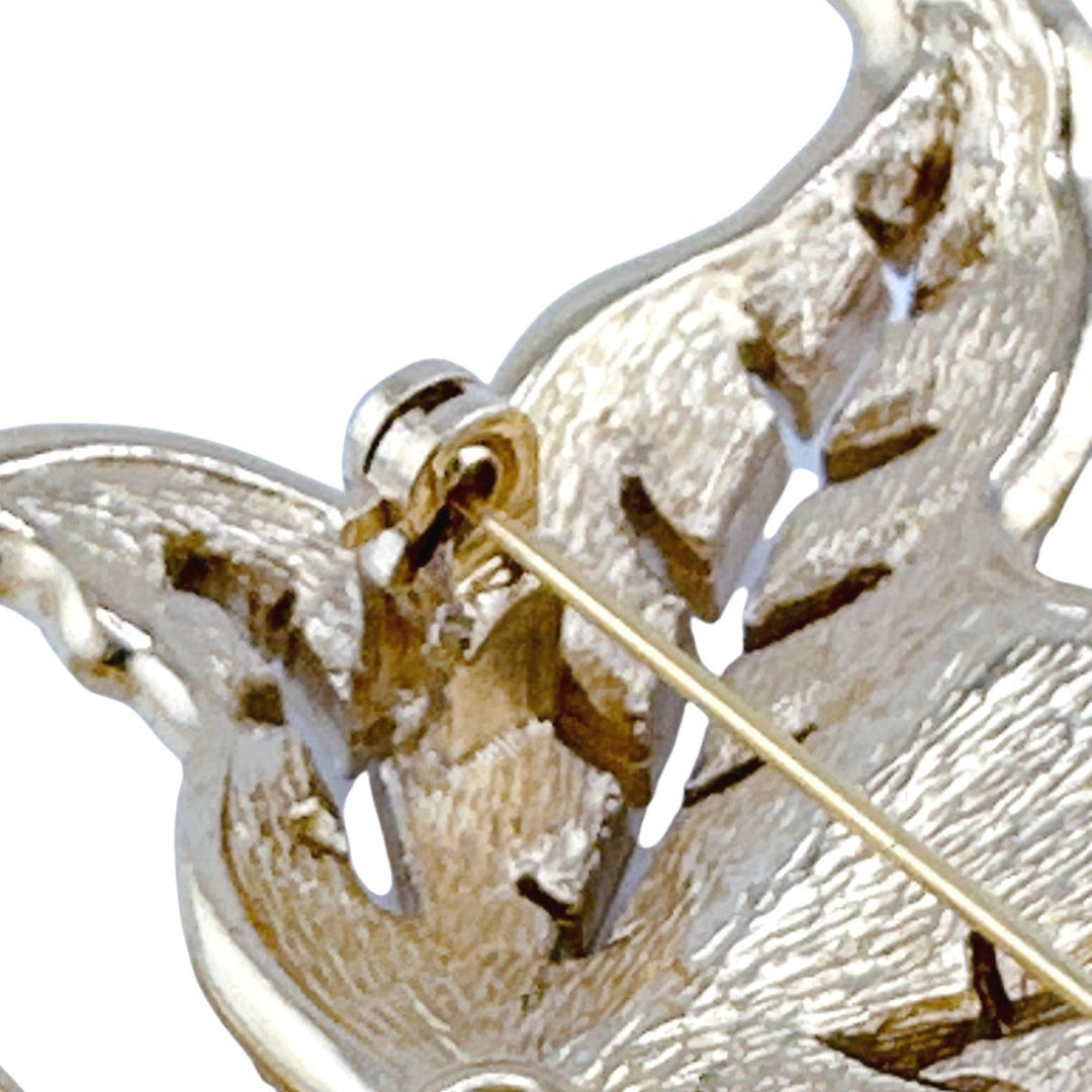 Christian Dior Brooch metal gold rotating pin type Leaf motif Light stone unisex(Unisex) Used Authentic
