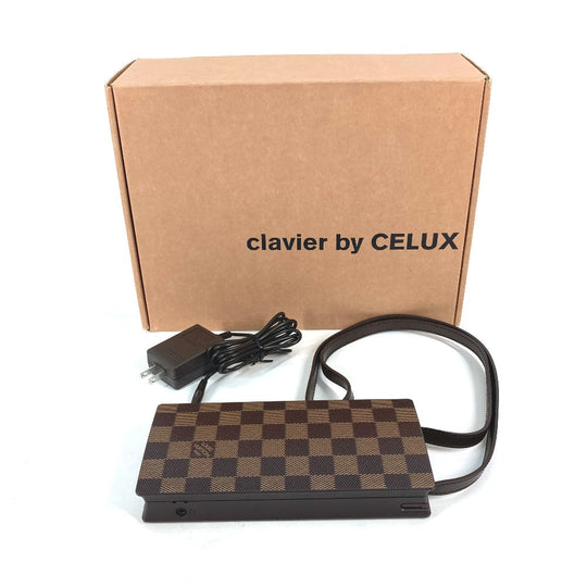 LOUIS VUITTON Other miscellaneous goods Plastic, PVC Brown CELUX VIP Customer Damier Backpack Clavier 25th Anniversary Staff Limited PC mens(Unisex) Used Authentic