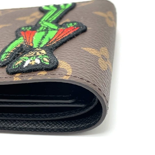 LOUIS VUITTON Folded wallet M80156 Monogram canvas Brown Animal Monogram Portefeuille Slender NM mens Used Authentic
