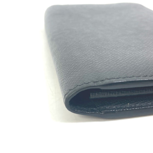 LOUIS VUITTON Long Wallet Purse M69409 Taiga Leather black Taiga Zippy dragonne mens Used Authentic