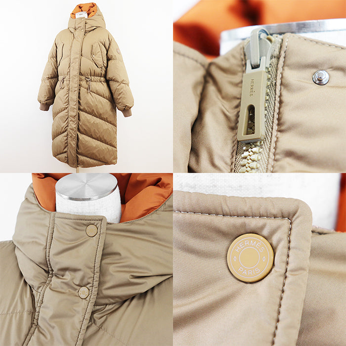 HERMES Down jacket Filling: 55% cashmere, 45% polyester; Outer: 100% polyester; Lining: 100% polyester; Filling: 90% down, 10% feather; Rib: 100% wool; Other fabric: 57% rayon, 43% polyester Light Brown, Orange Women 36 Used Authentic