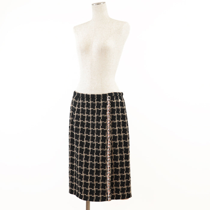 CHANEL skirt [Outer material] 55% silk, 36% cotton [Lining] 100% silk Black camel Women 42 Used Authentic