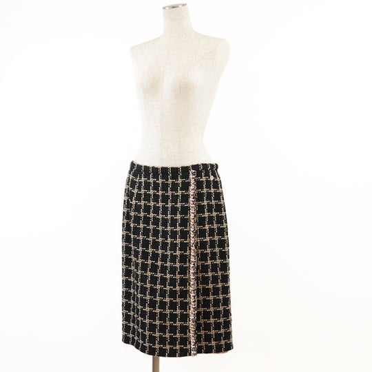 CHANEL skirt [Outer material] 55% silk, 36% cotton [Lining] 100% silk Black camel Women 42 Used Authentic
