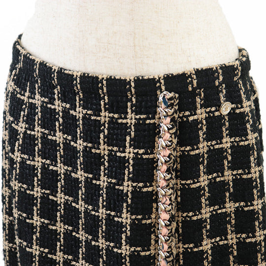 CHANEL skirt [Outer material] 55% silk, 36% cotton [Lining] 100% silk Black camel Women 42 Used Authentic