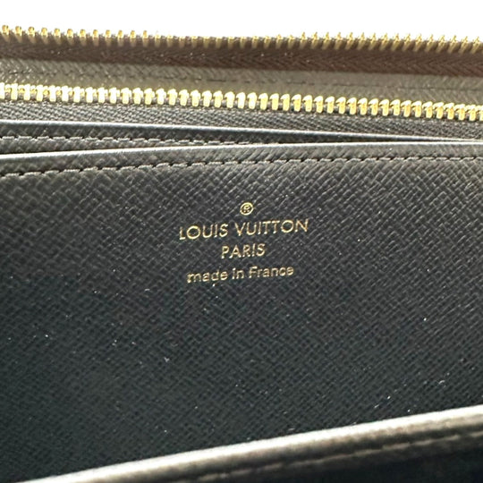 LOUIS VUITTON Long Wallet Purse M69353 Monogram canvas Brown Giant reverse Monogram Zippy wallet mens(Unisex) Used Authentic