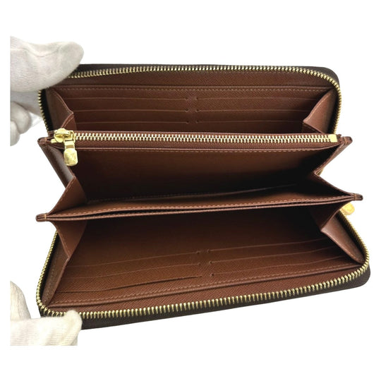 LOUIS VUITTON Long Wallet Purse M42616 Monogram canvas Brown Zip Around Monogram Zippy wallet mens(Unisex) Used Authentic