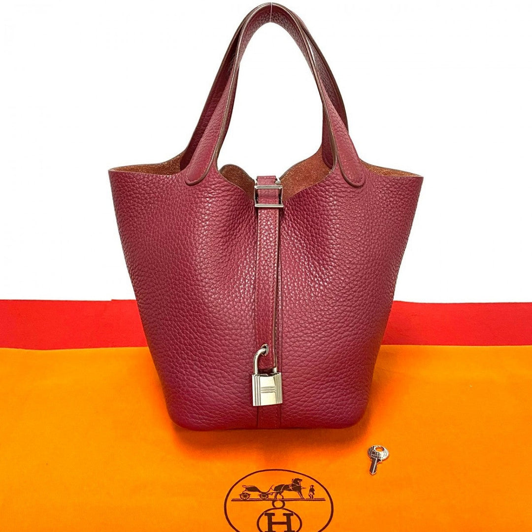 HERMES Handbag Taurillon Clemence pink Picotan Lock PM