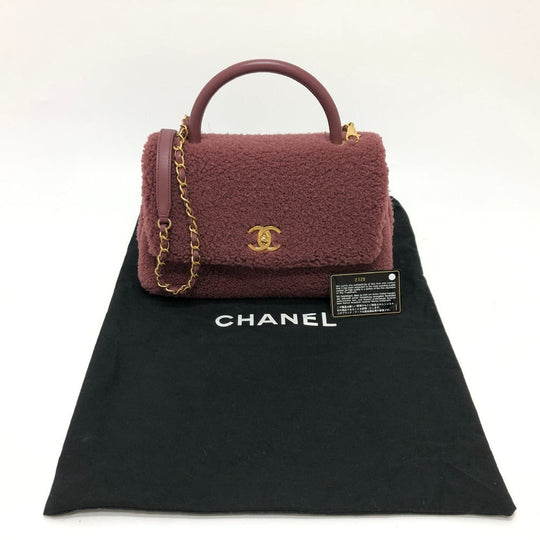 CHANEL Handbag Mouton, Leather wine-red Boa Coco Handle
