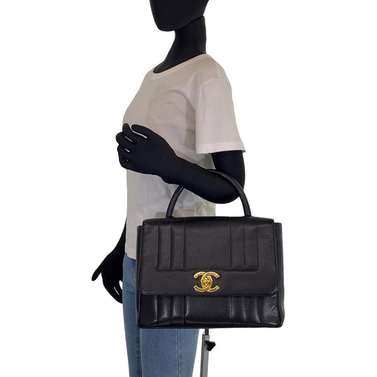 CHANEL Handbag Caviar skin Black GoldMetal Top handle handbag COCO Mark Turnlock Mademoiselle Women Used Authentic