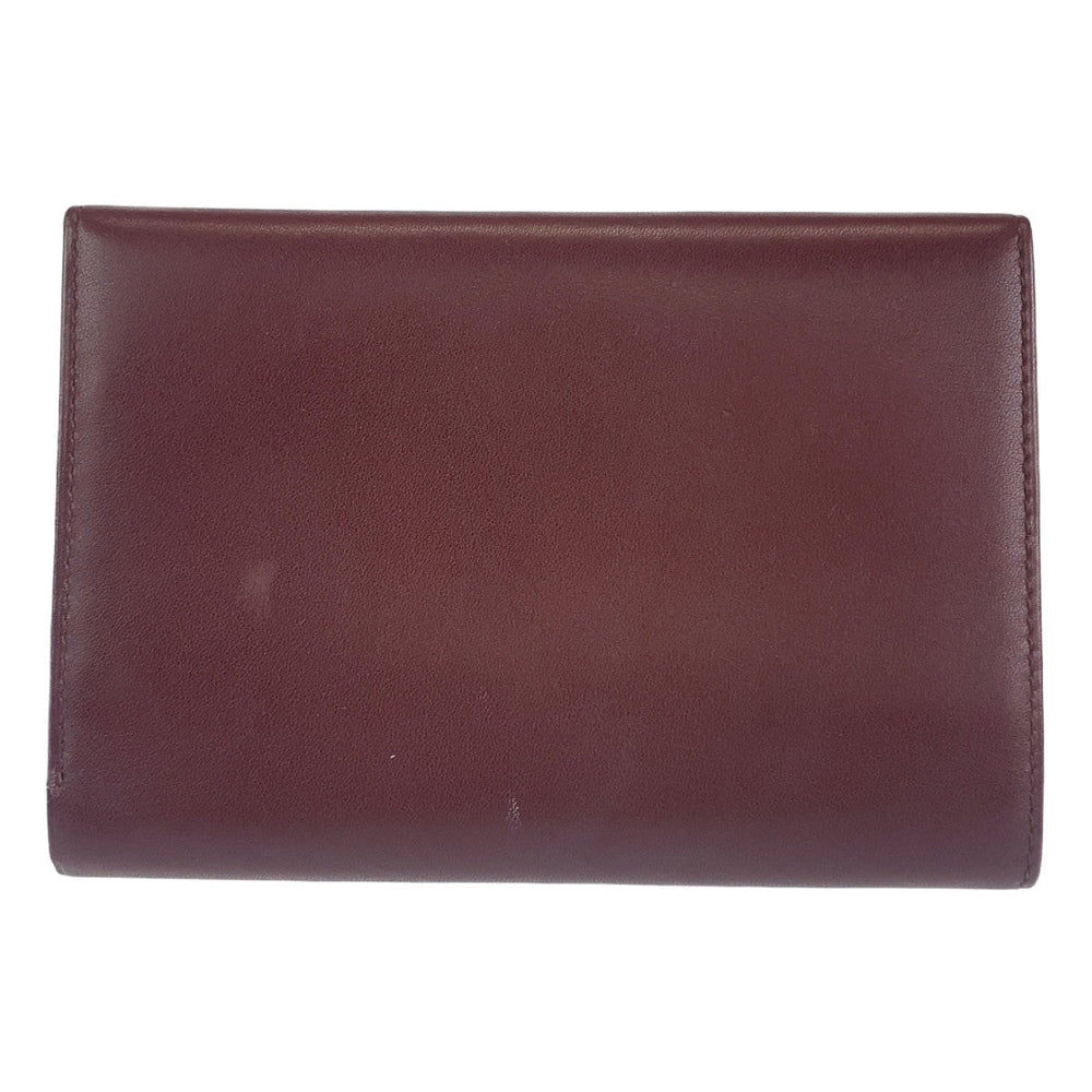 CARTIER Tri-fold wallet leather wine-red Must Line
