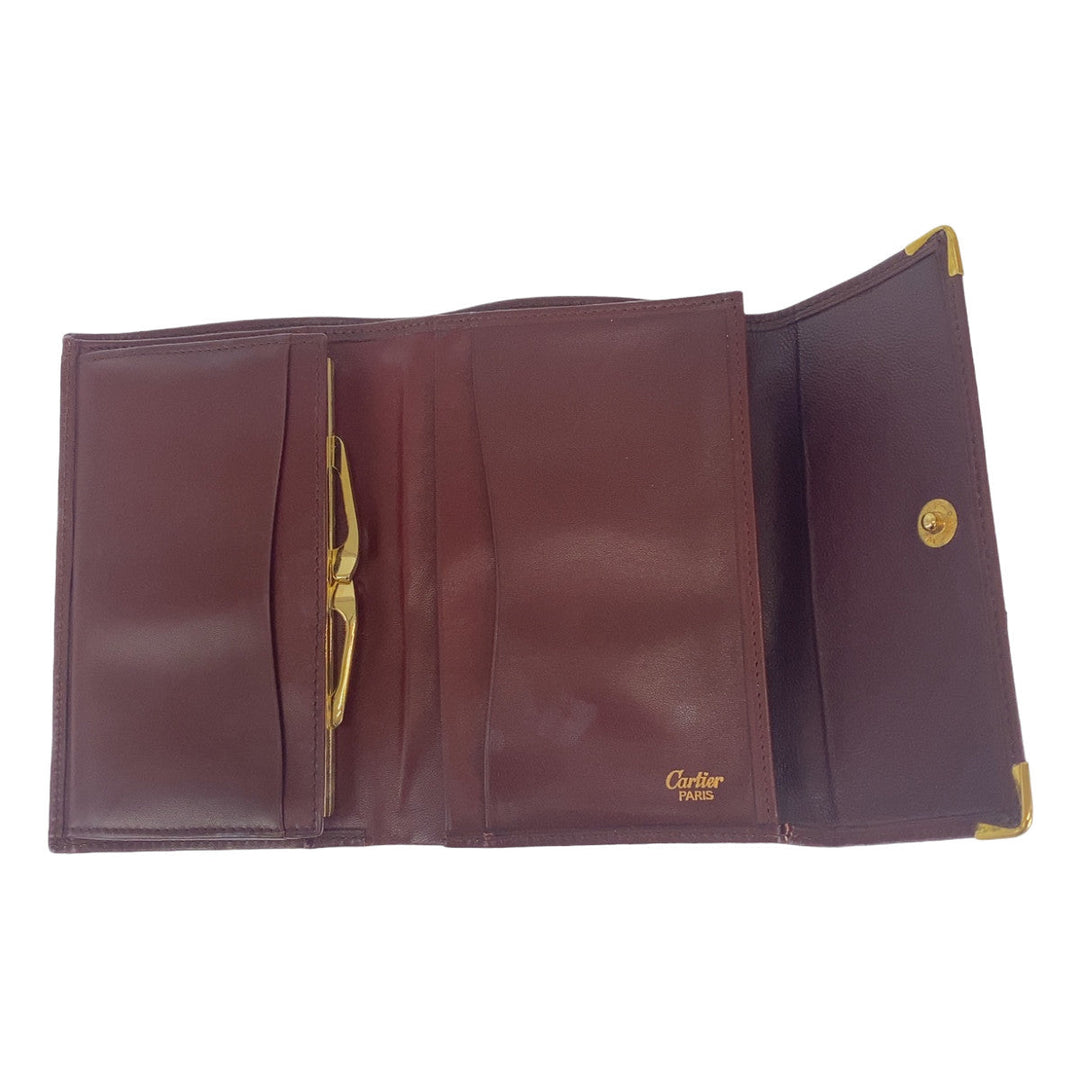 CARTIER Tri-fold wallet leather wine-red Must Line