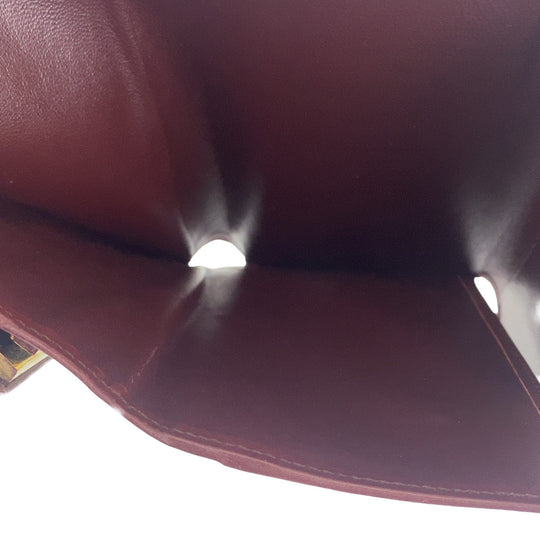 CARTIER Tri-fold wallet leather wine-red Must Line
